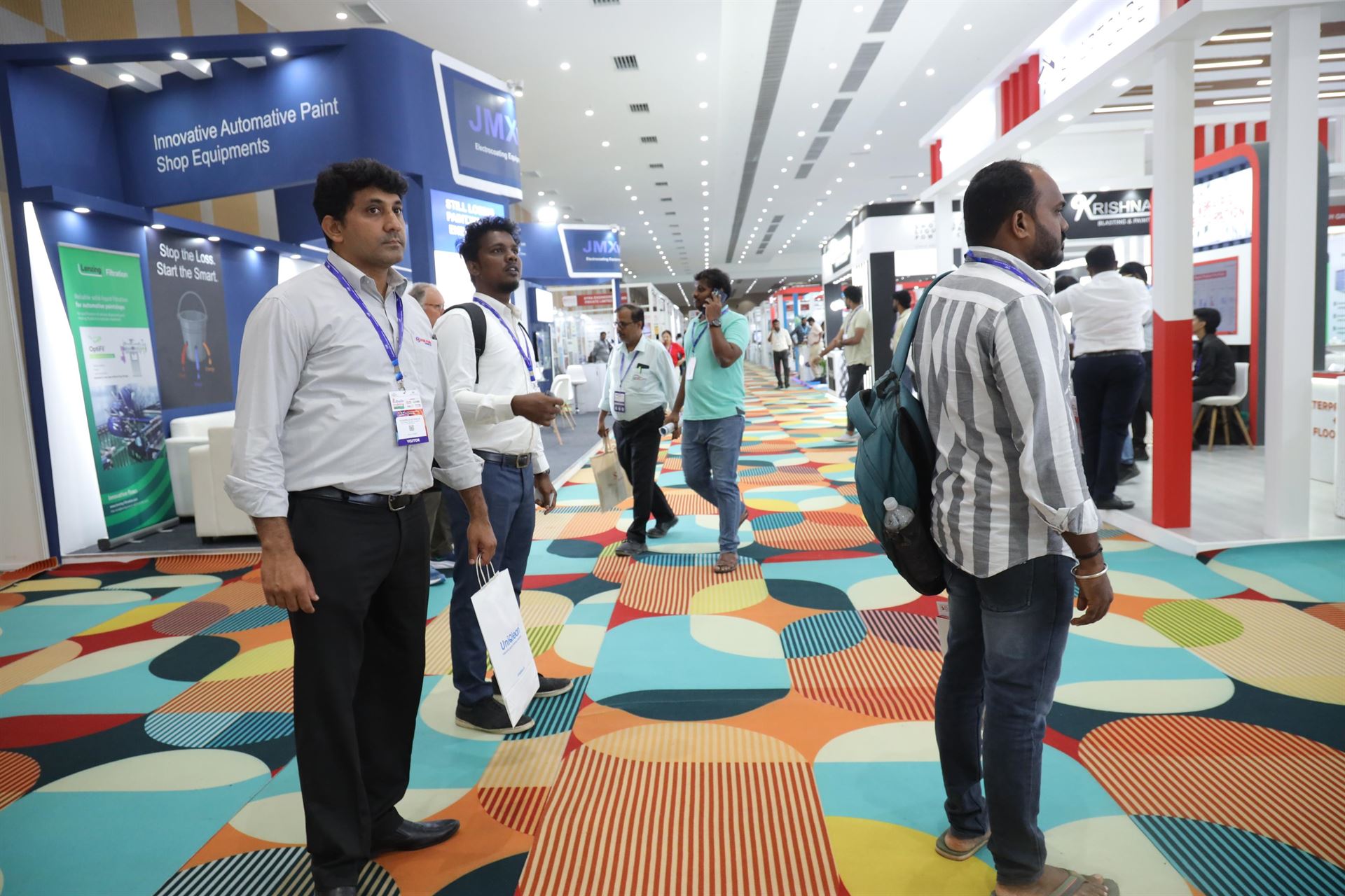 Visitors at exhibitor stalls, SCE 2025
